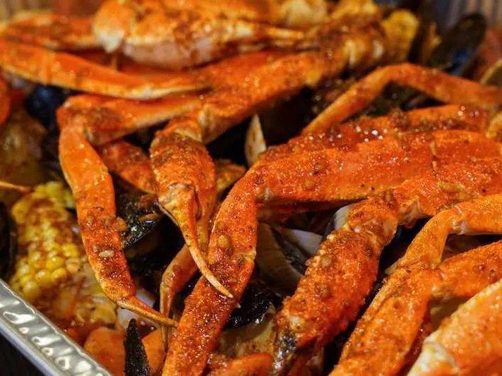 Spicy snow crab legs with corn and mussels at Dummy Crabby III, a Seafood Restaurant in Tampa