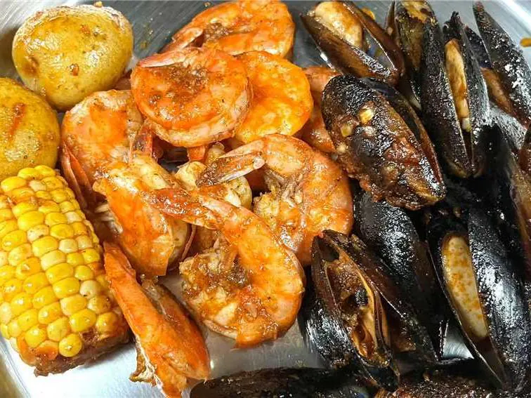 Spicy shrimp and mussels with corn and potatoes at Dummy Crabby III, a Seafood Restaurant in Tampa